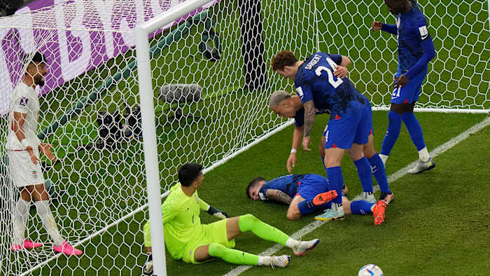 Christian Pulisic in the Iran goal after scoring to give the U.S. the lead